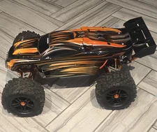 Upgraded Orange & Black E-REVO Mamba Monster RC Truck -w- Fly Sky FS-iT4 Remote