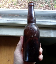AMBER ANHEUSER BUSCH EAGLE & LETTER "A" ONLY PRE PROHIBITION BEER BOTTLE