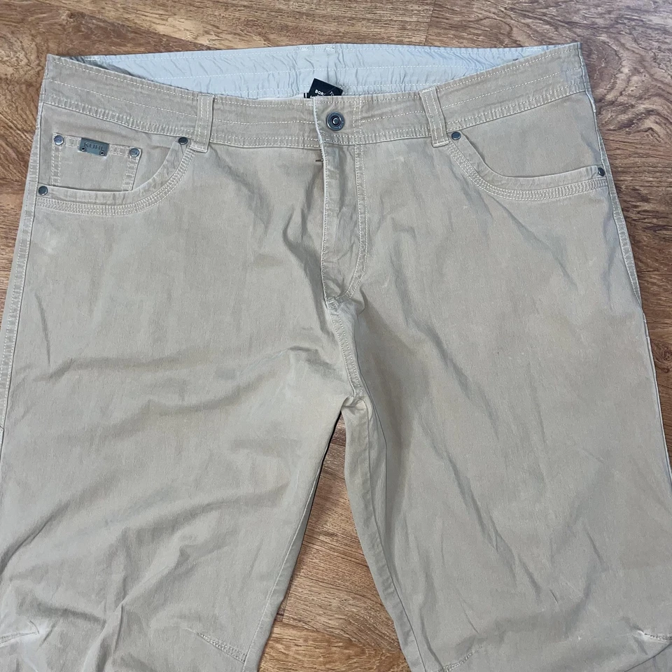 Calça Kuhl Outdoor Masculina 42x34 Cáqui Elástica Nylon Roupa de Trabalho Caminhada Corante Pátina - Imagem 2 de 4