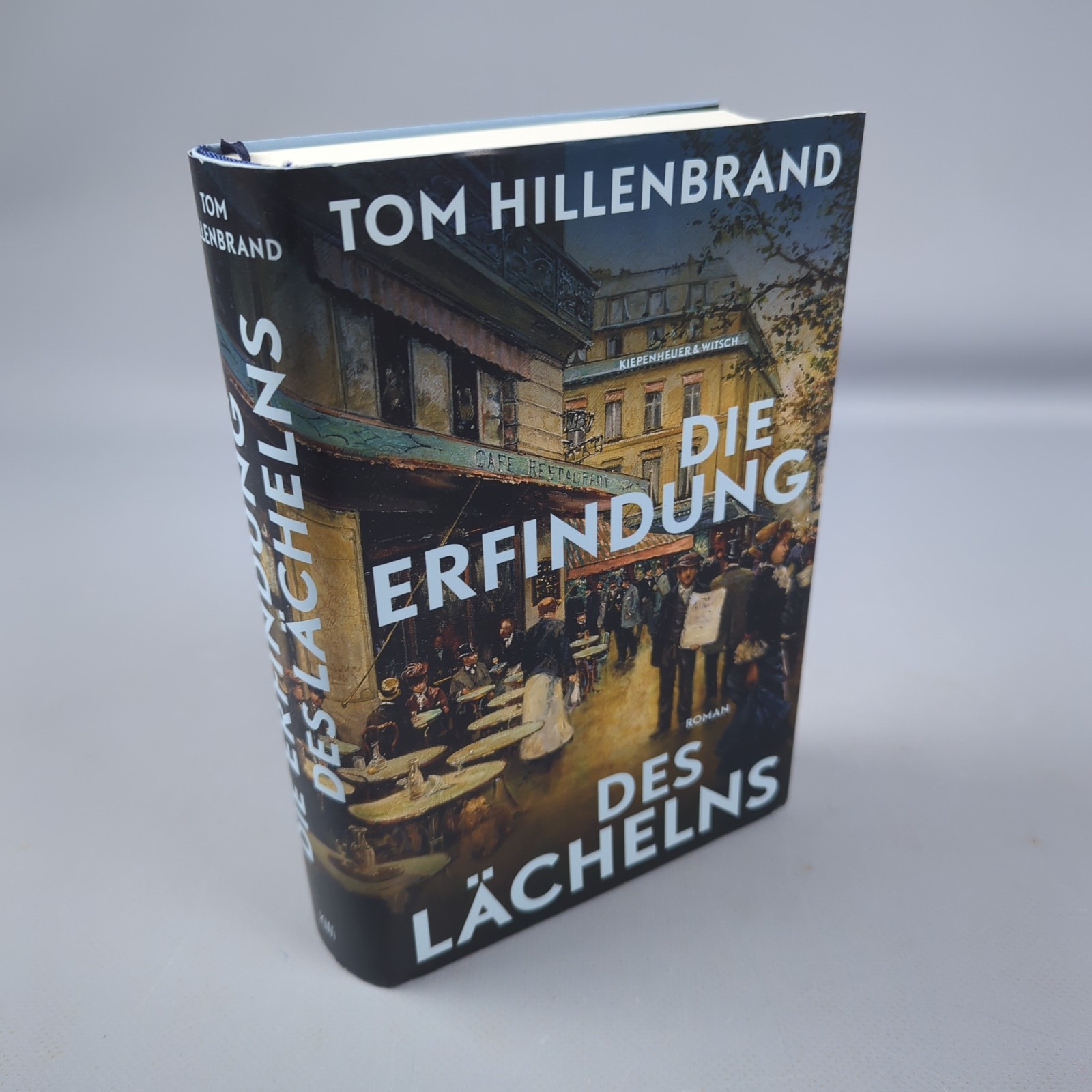 Tom Hillenbrand: Die Erfindung des Lächelns (Gebundene Ausgabe
