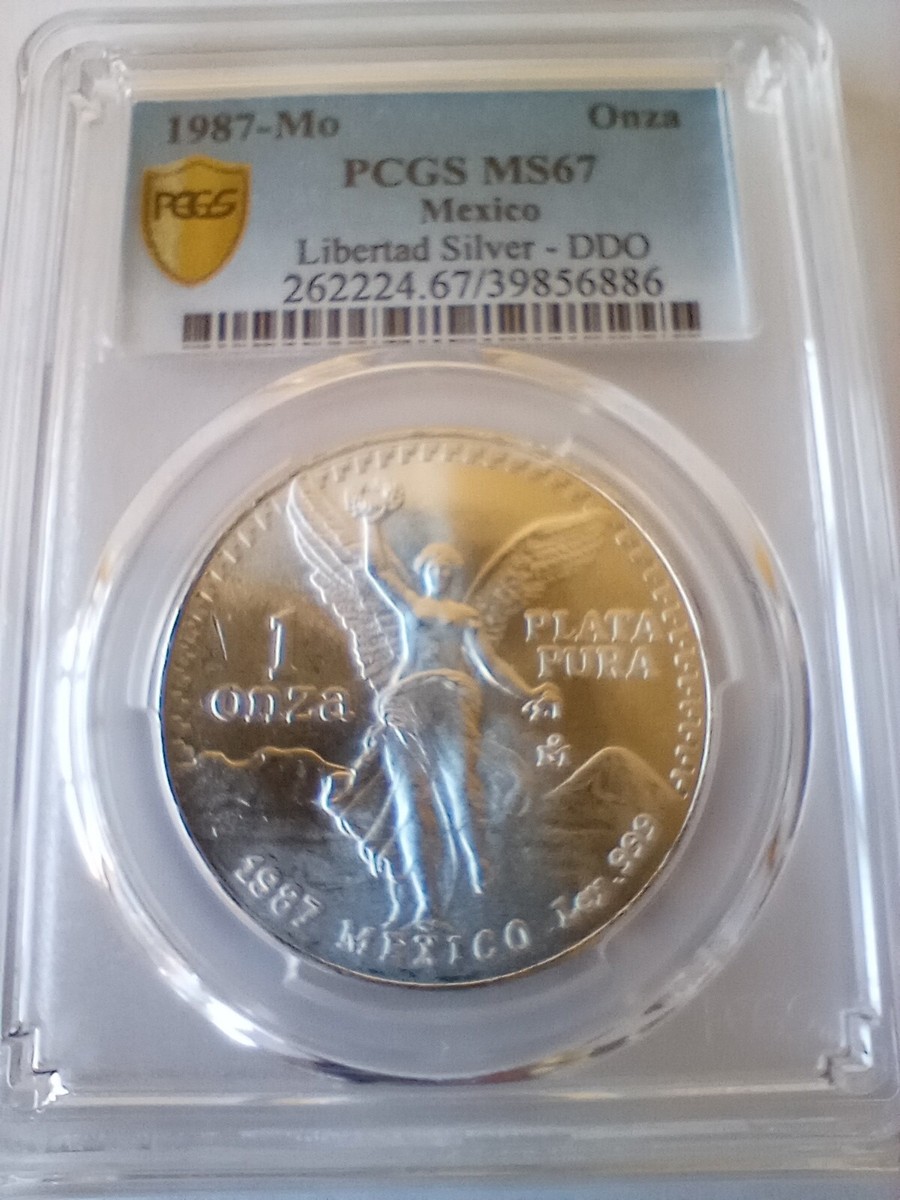 1987-Mo Mexico Libertad Silver DDO ONZA PCGS MS67 GOLD SHIELD