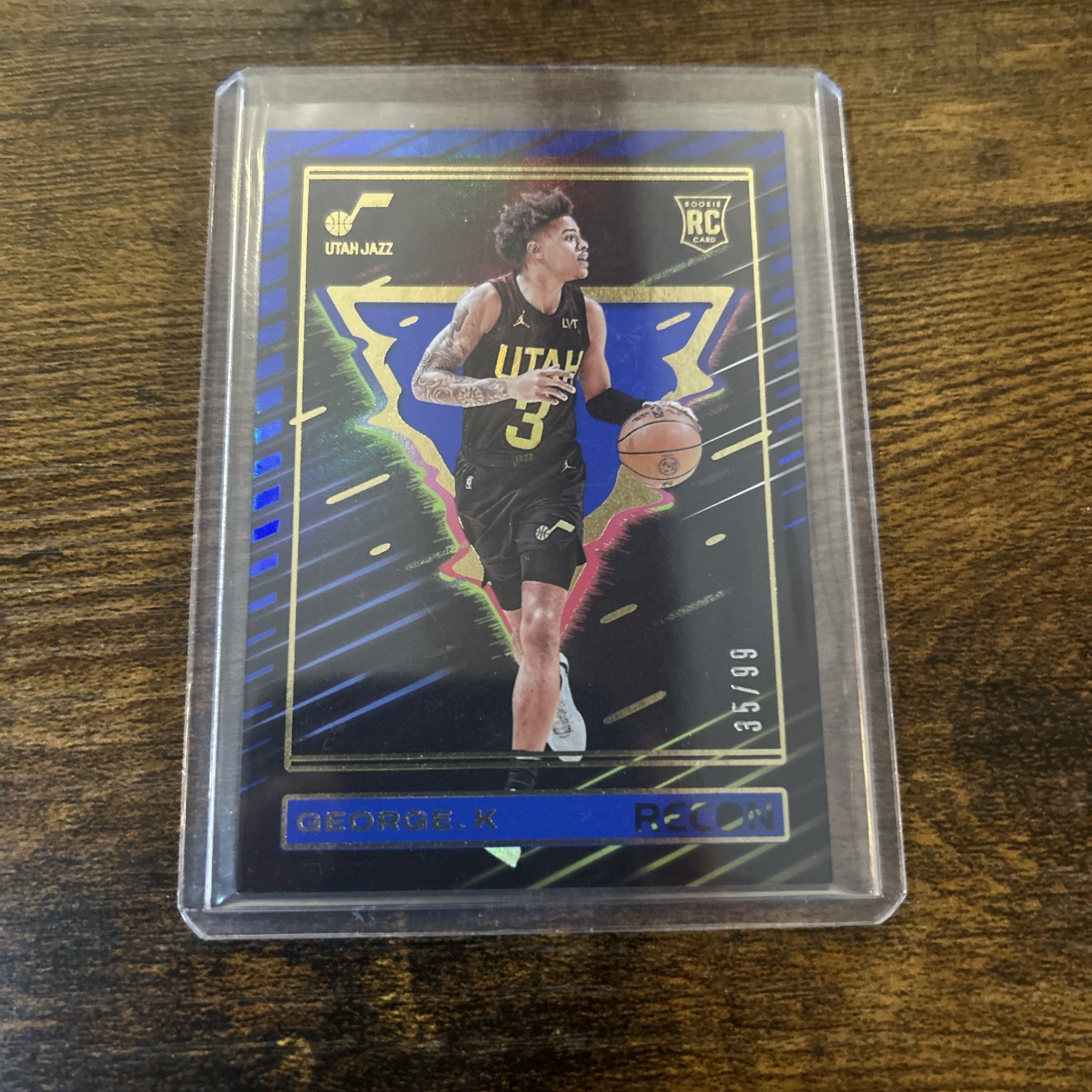 2023-24 Panini Recon - Rookies Keyonte George #237 Holo Blue /99 (RC)