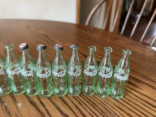 Lot Of 12 Vintage Mini Coca Cola Bottles 3” Tall With Caps