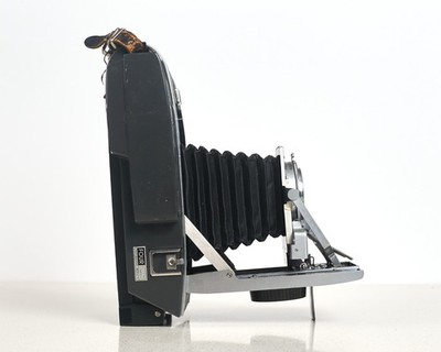 Polaroid 120 camera converted to to shoot on instant peel-apart