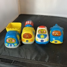 Lot of 4 Vtech Go Go Wheels construction police airplane dump truck AD