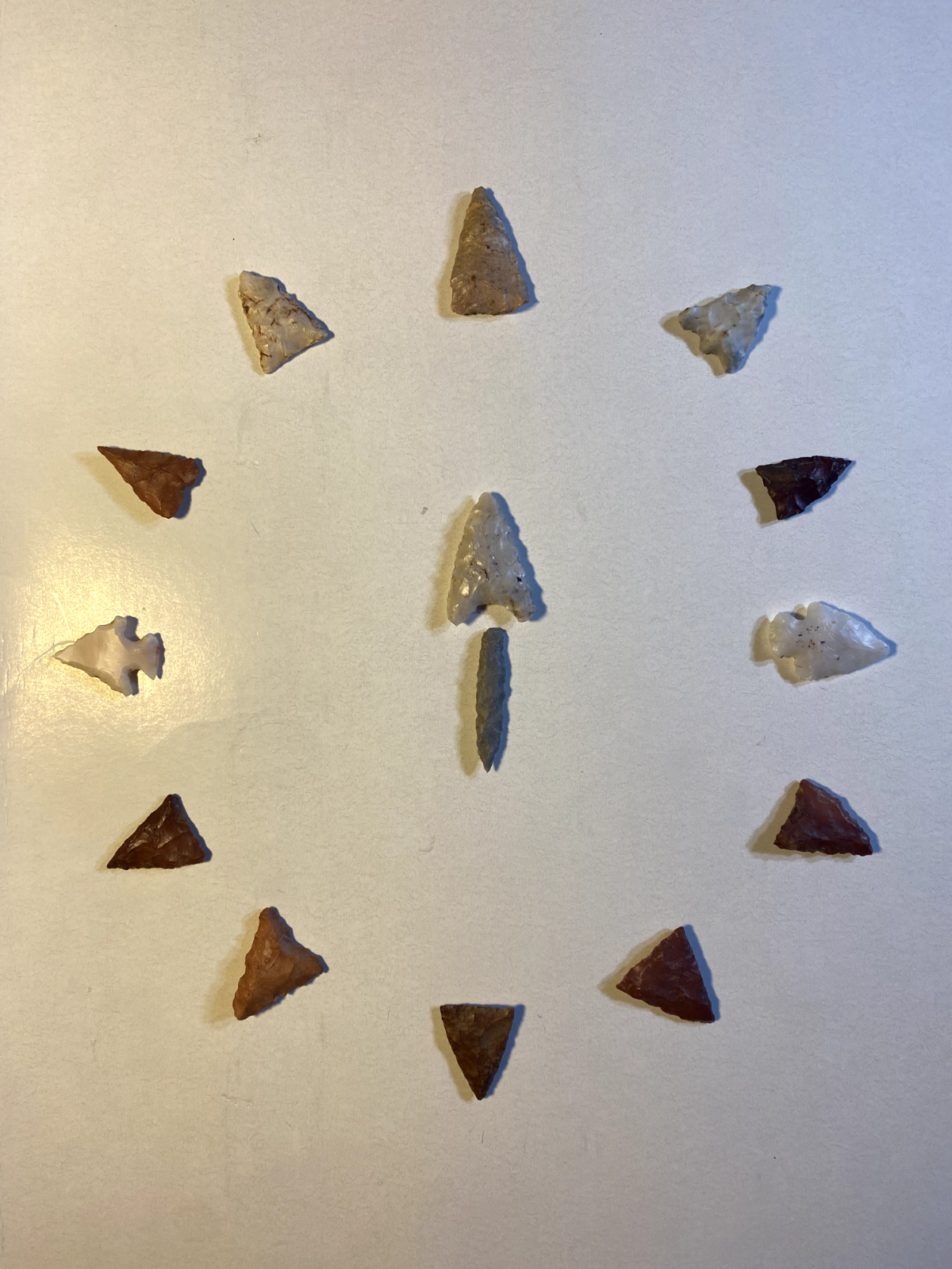 Authentic Indian arrowhead collection; 14 piece set in a clock ...