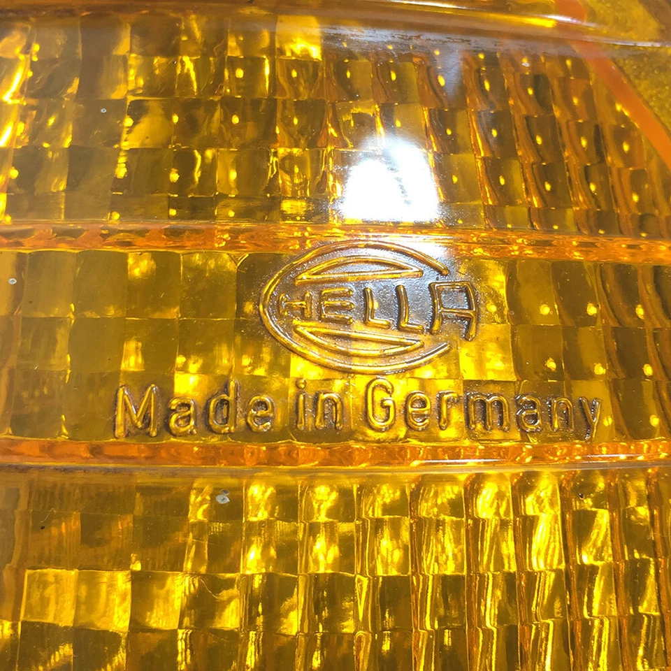 Lámpara de señal de giro delantera izquierda Mercedes Benz W123 300D Hella LH A0008208821 Foto 2 de 4