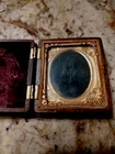 Tintype Photograph of  woman in brown ornate Gutta Perche ornate case
