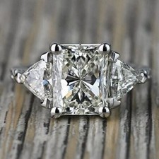 5.24Ctw Radiant Cut Moissanite Three Stone Engagement Ring 14K White Gold Plated