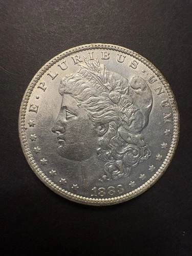 1883-O $1 Morgan Silver Dollar, UNC/AU Slider