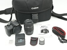Canon EOS Rebel SL1 18.0MP DSLR with 18-55mm STM Extras Bag, SD Card