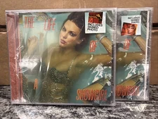 Taylor Swift Life of a Showgirl signed CD #1 and #4