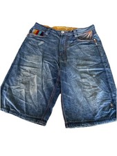 vintage Coogi denim shorts, featuring a baggy fit and multi-color accents