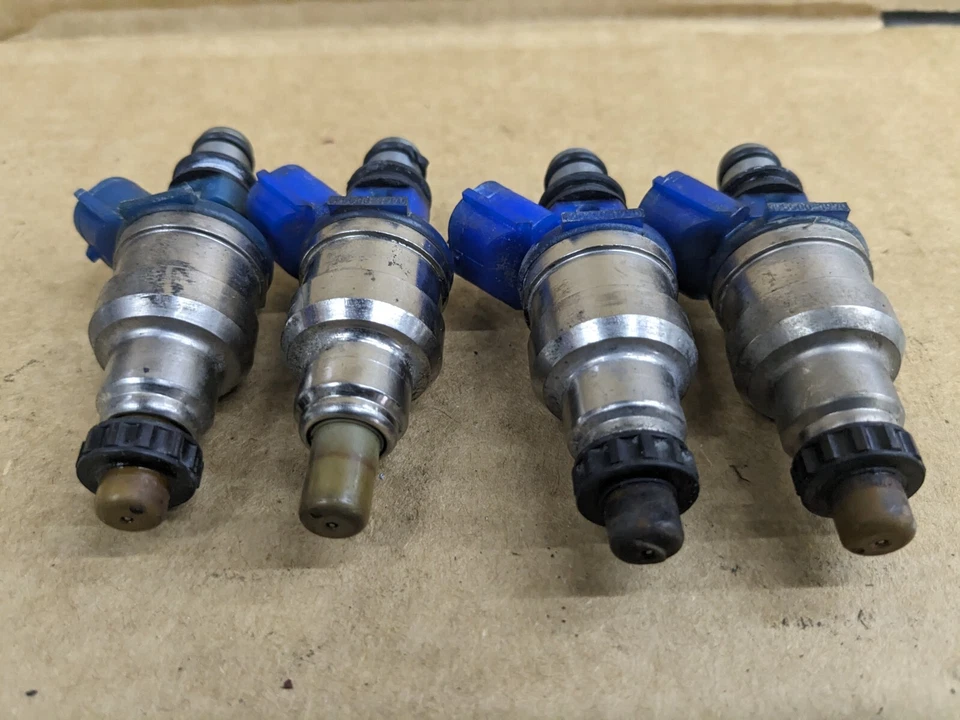 90-93 Mazda Miata MX5 MX-5 OEM NA6 1.6 Juego de inyectores de combustible 4 USADOS azul 1990-1993 Foto 2 de 3