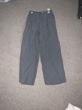 Gray Pants With White Buttons