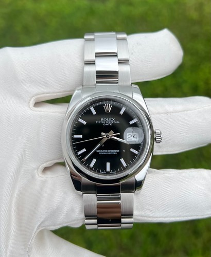 Rolex Oyster Perpetual Date Black Dial Reference 115200