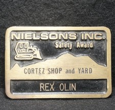 WI11134 COOL VINTAGE 1970s *NIELSONS INC. SAFETY AWARD* SOLID BRASS BELT BUCKLE
