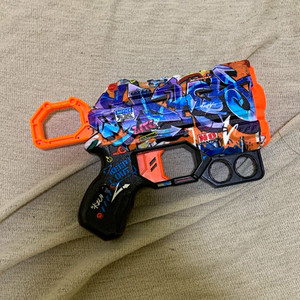 X-Shot Excel Foam Dart Blaster Gun, Graffiti Print Multicolor Camo Orange/Black