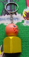Vintage upcycled wooden fisher price frowning freckled little people keychain
