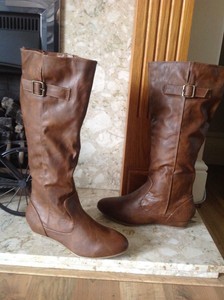 pointed flat knee high boots