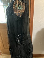 Beautiful Tea Length Black Sequined Dress With Taffeta Skirt And 3/4 Length Slee