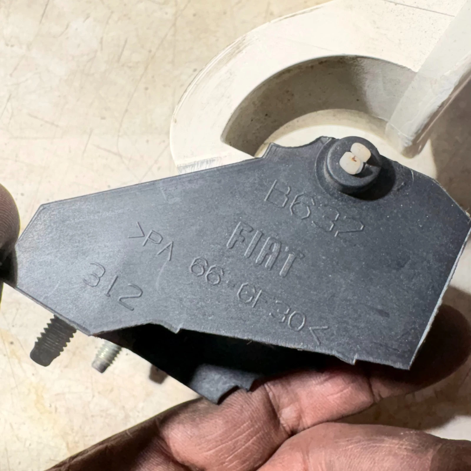 Fiat 500 fuel flap rear carrier showing Fiat 312 and PA66 GF30 markings
