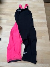 Used but very good condition. Black & Pink  Speedo Fastskin Kneesuit. Size 26.