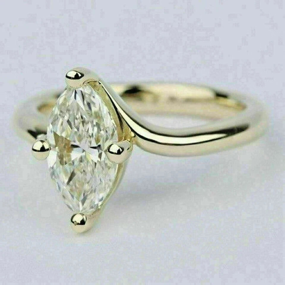 Anillo de boda solitario de diamantes creado en laboratorio marquesa de 2 quilates enchapado en oro amarillo de 14 quilates Foto 2 de 4