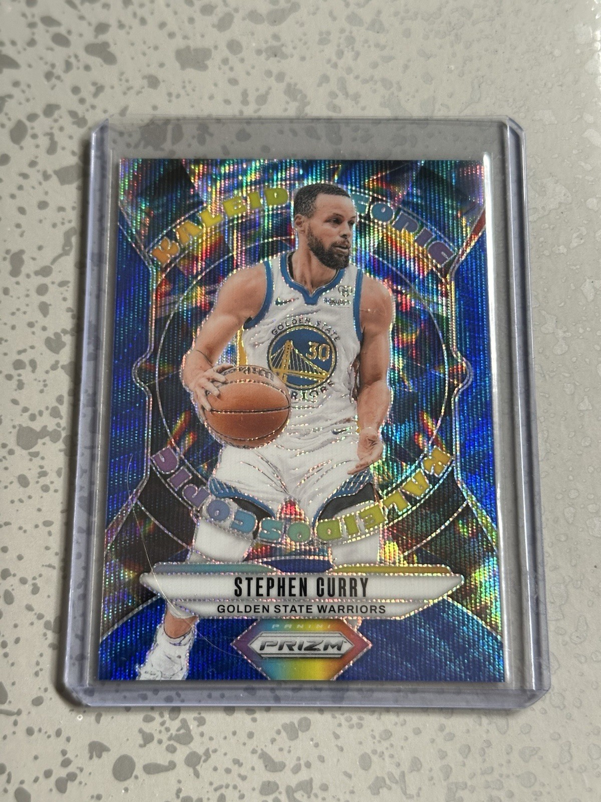 Stephen Curry 2024-25 Panini Prizm Blue Wave Kaleidoscopic #12 68/175