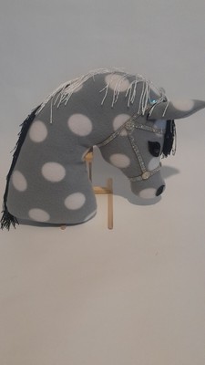 Pony head pillow made from soft plush multicolor fabric, with halter accessory