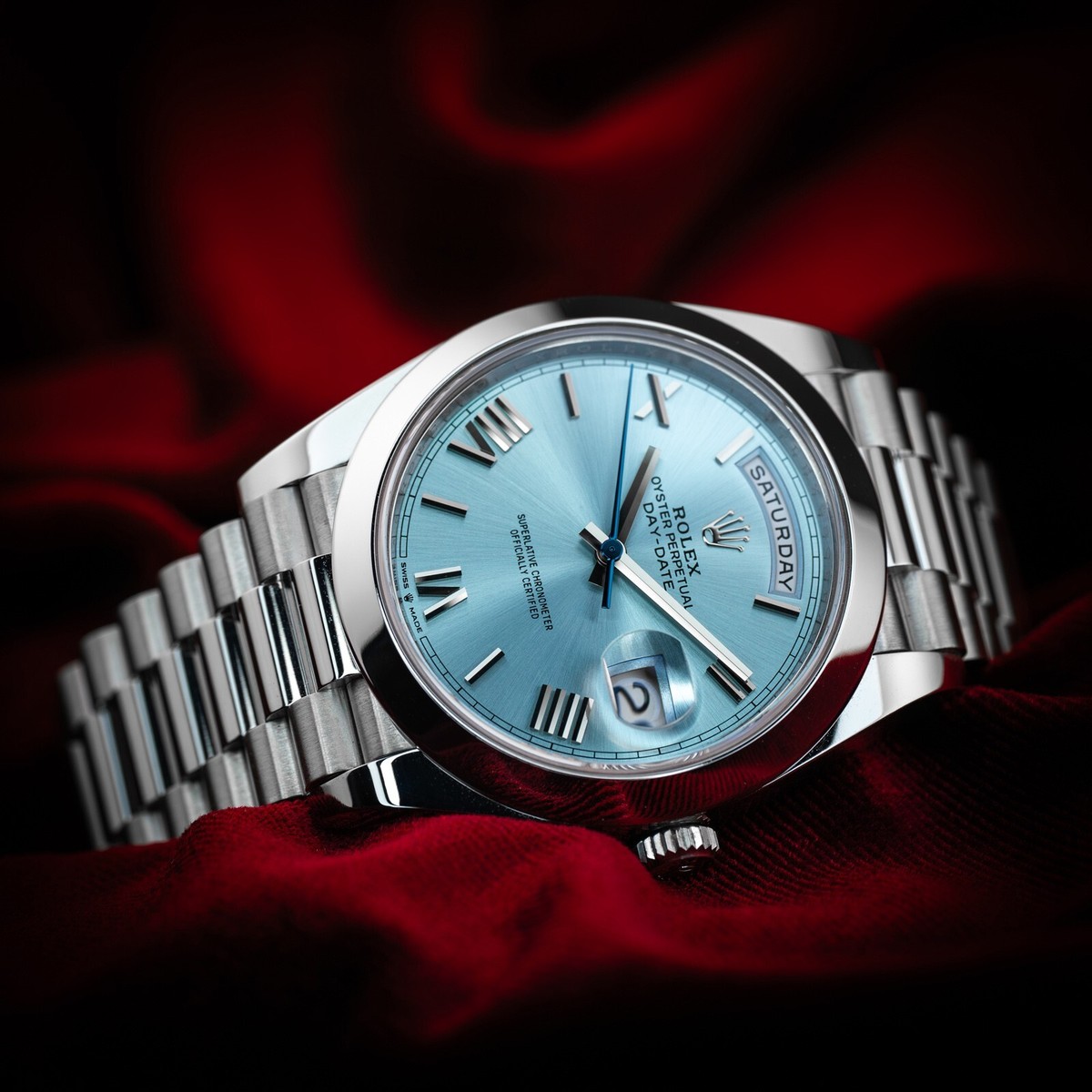 Rolex Day-Date 40 228206 Ice Blue Roman Dial Platinum Smooth Bezel