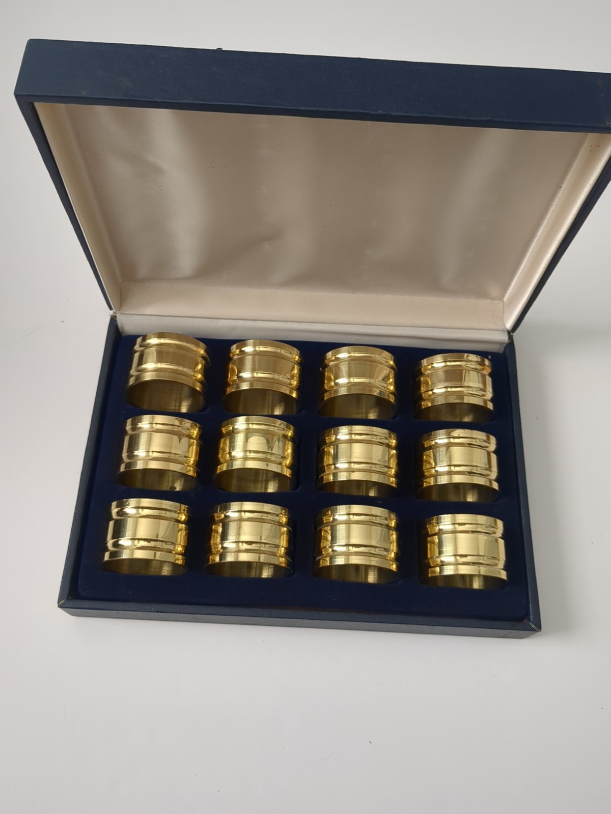 Vintage Blue Velvet Lined Boxed Set Of 12 Solid Brass Napkin Rings  1