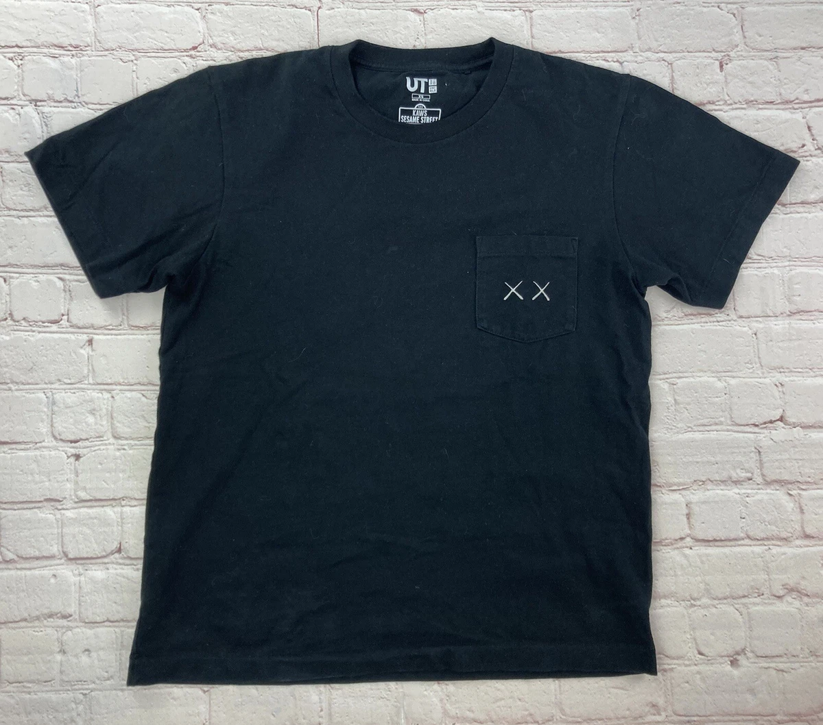 kaws pocket tee