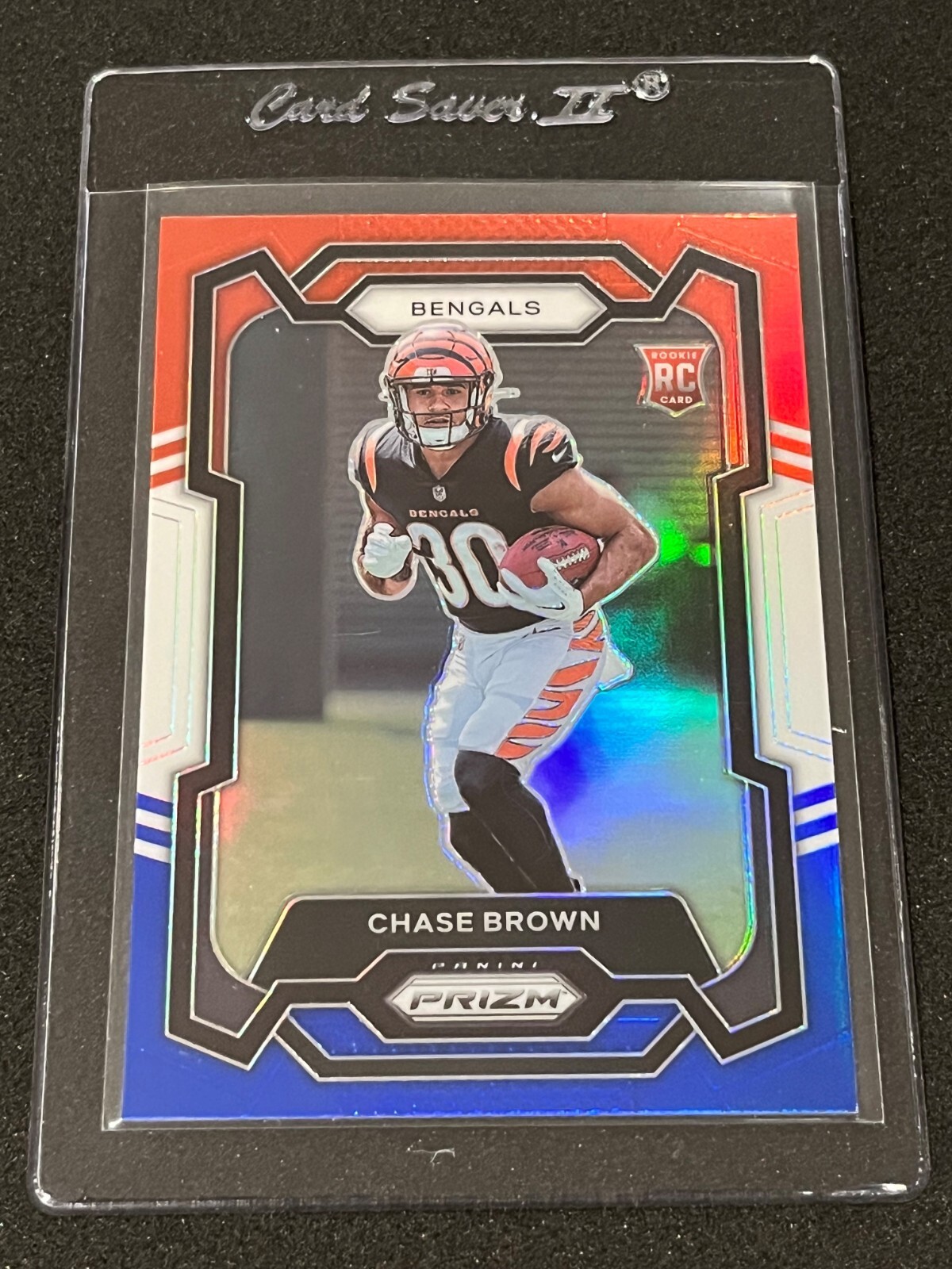 2023 Panini Prizm Football Chase Brown Rookie Red/White/Blue Prizm #318 Bengals