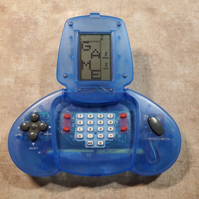 Working Pro Tech GI-706H Handheld Game System, Blue Clear, Clean Terminals!