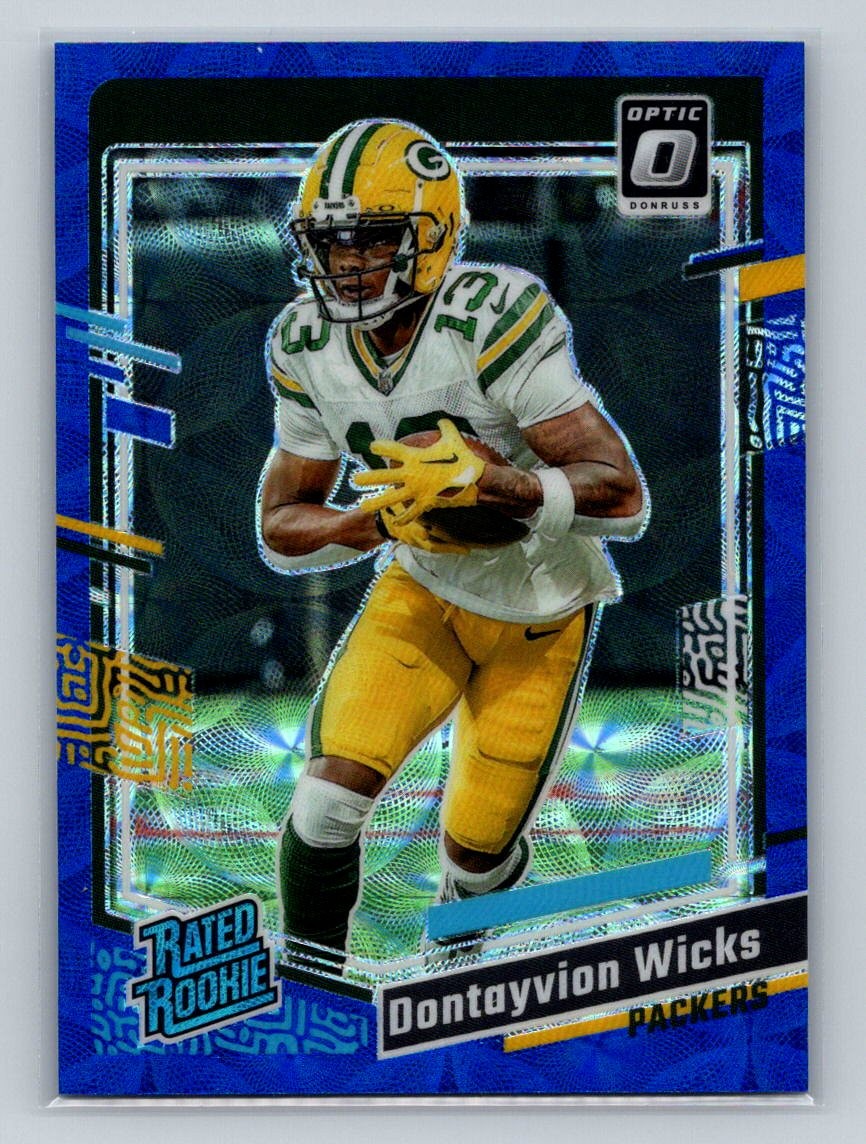 2023 Donruss Optic #249 Dontayvion Wicks Blue Scope