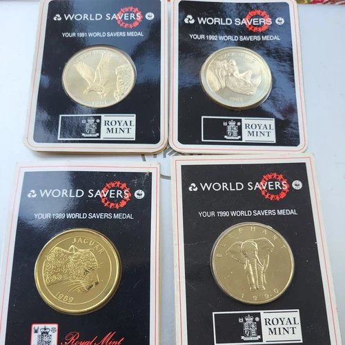 World Savers coin collection- Rhino, Jaguar, Elephant   and Golden Eagle.