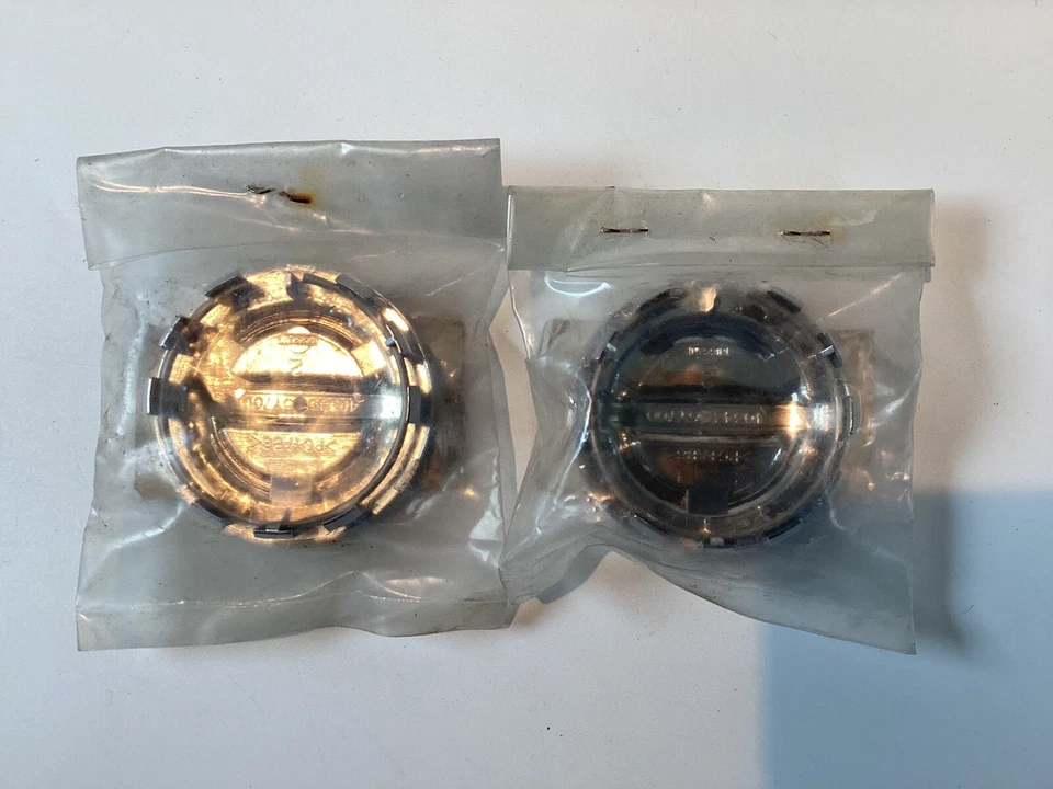 NISSAN ALTIMA MAXIMA MURANO (2) TAPACUBOS TAPACUBOS TAPACUBOS TAPA CENTRAL ENCHUFE NUEVO Foto 2 de 4