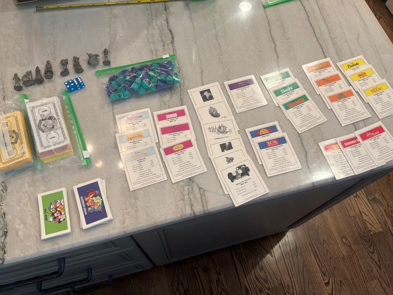 Monopoly Disney Edition 2001 game pieces cards money, partial set