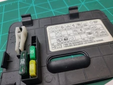 2007-2012 Mitsubishi Eclipse Spyder Convertible Interior Fuse Box Cover Lid OEM