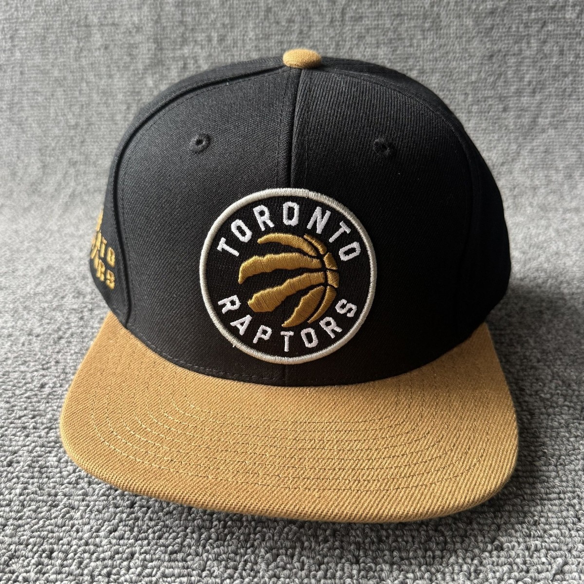 Mitchell & Ness Toronto Raptors Retro Snapback Hat Black Tan Flat Brim