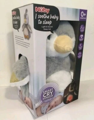Juguete de peluche Nuby Soft Penguin ayuda para dormir bebé sensor inteligente para llorar 0 meses + - NUEVO