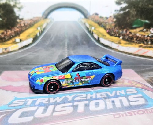 Hot Wheels Nissan Skyline Custom Autism Awareness W Spectraflame And Real Riders - Picture 2 of 3