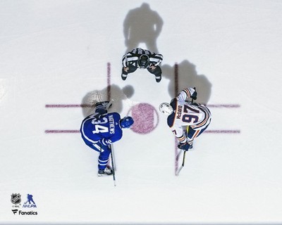 Connor McDavid Edmonton Oilers Unsigned Face-Off vs. Auston Matthews Photograph