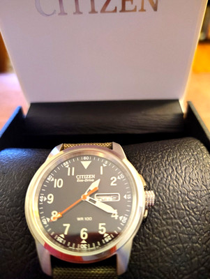 CITIZEN ECO-DRIVE CHANDLER FIELD WATCH; BM8180-03E; BLACK DIAL/DATE GREEN BAND