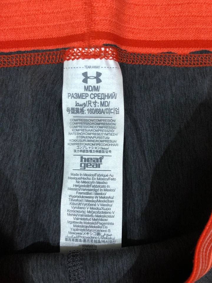 Pantalones Cortos Mujer UNDER ARMOUR Medianos Ajustados Gris Y Naranja Foto 4 de 4