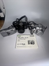 Lot Of 3 Old Cameras Canon , Vivitar, Cannon and Nikon UNTESTED 