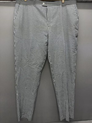Linea Uomo Pants Feature a Classic Black And White Gingham Check Pattern.