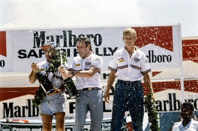 Terry Harryman Tony Fall Ari Vatanen celebrate victory by sprayin- 1983 Photo