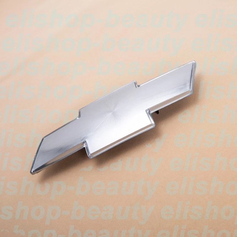 NUEVO 1999-02 Silverado 2000-06 Tahoe Suburban Parrilla Frontal Emblema Pajarita Plateado Foto 2 de 4